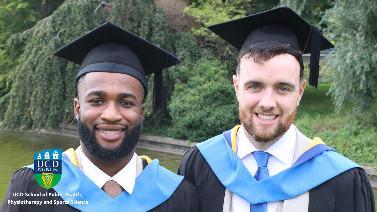 Two male graduate students smiling